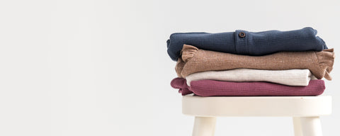 Organic cotton kids fall clothes collection featuring cozy sweaters and comfortable joggers for autumn