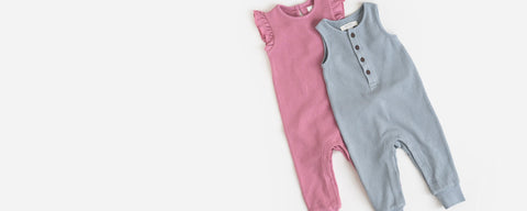 Organic cotton baby romper in neutral colors for sensitive skin comfort