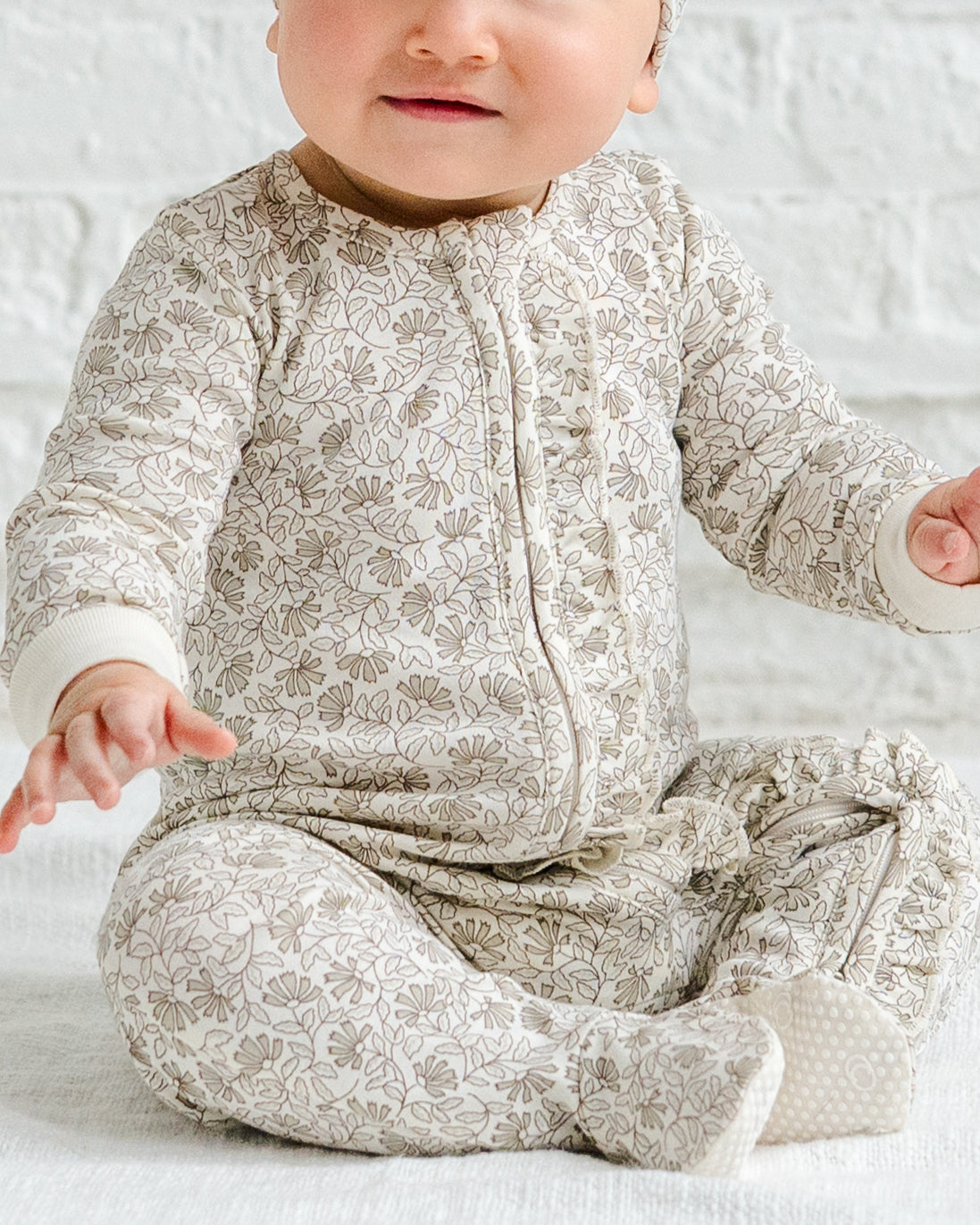 Neve Ruffle Zipper Footie Sale : Baby : One Pieces : Sleepers : Long Sleeves KENDI by Colored Organics Neve Ruffle Zipper Footie Baby | Colored Organics®