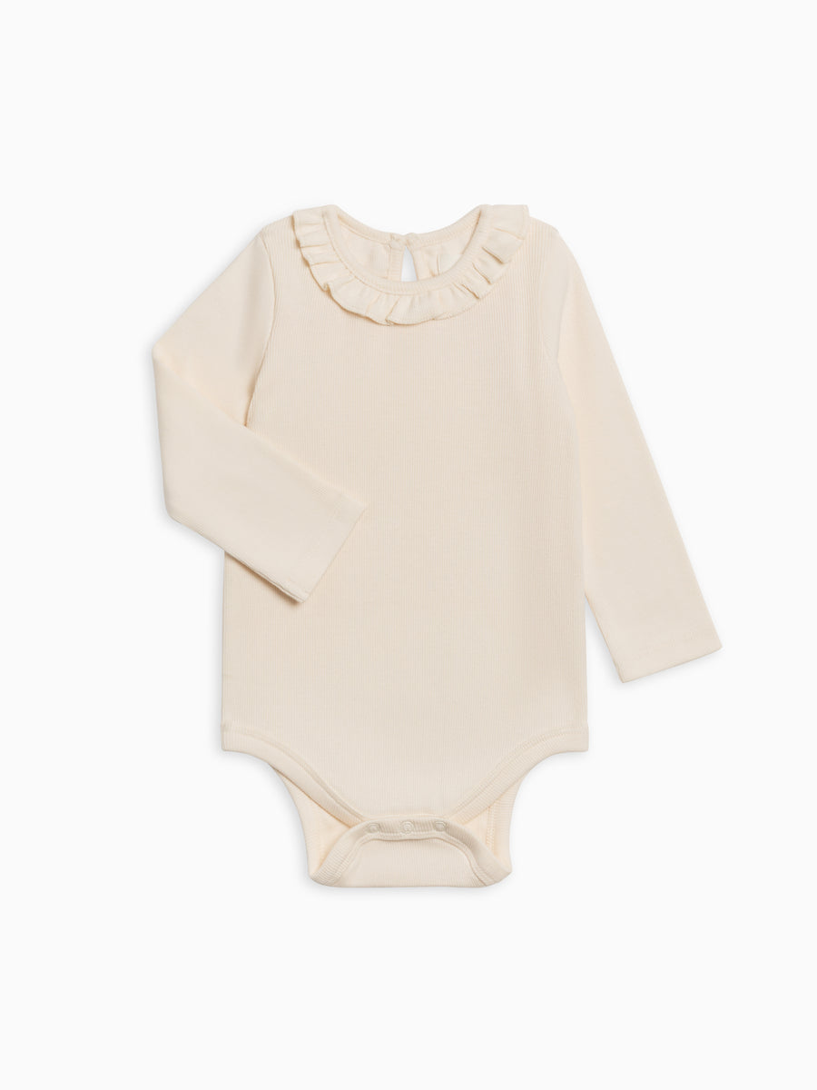 Irma Ribbed Ruffle Neck Bodysuit Sale : Baby : One Pieces : Bodysuits : Long Sleeves Kendi Organic Cotton Baby Irma Ribbed Ruffle Neck Bodysuit